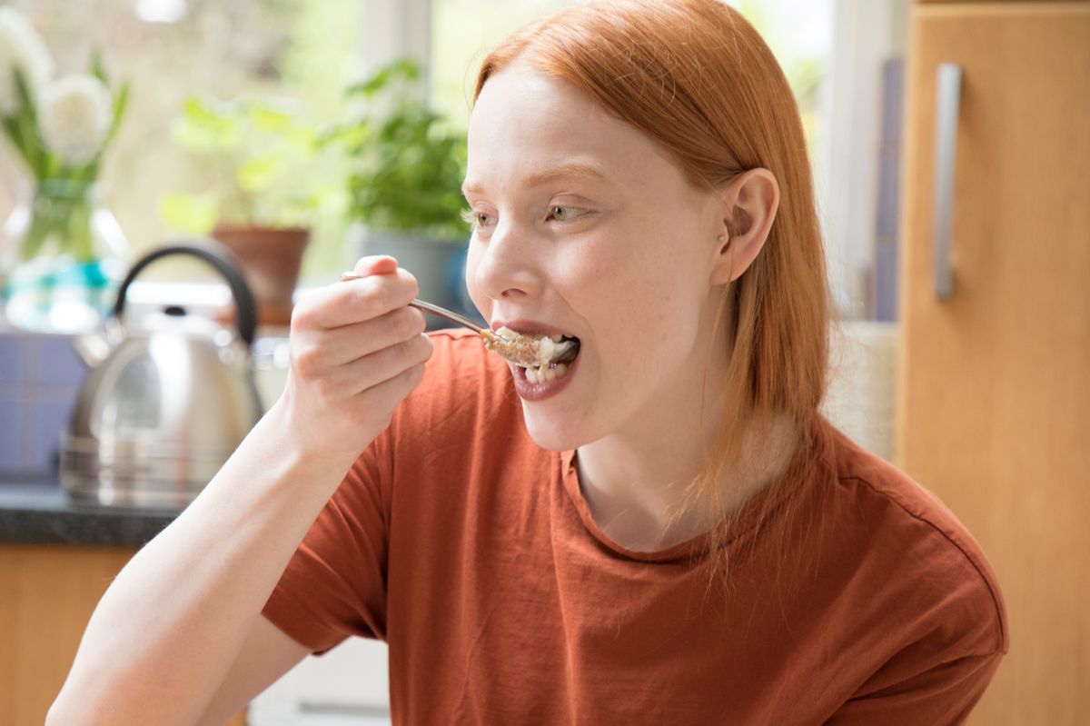 Woman eating meal