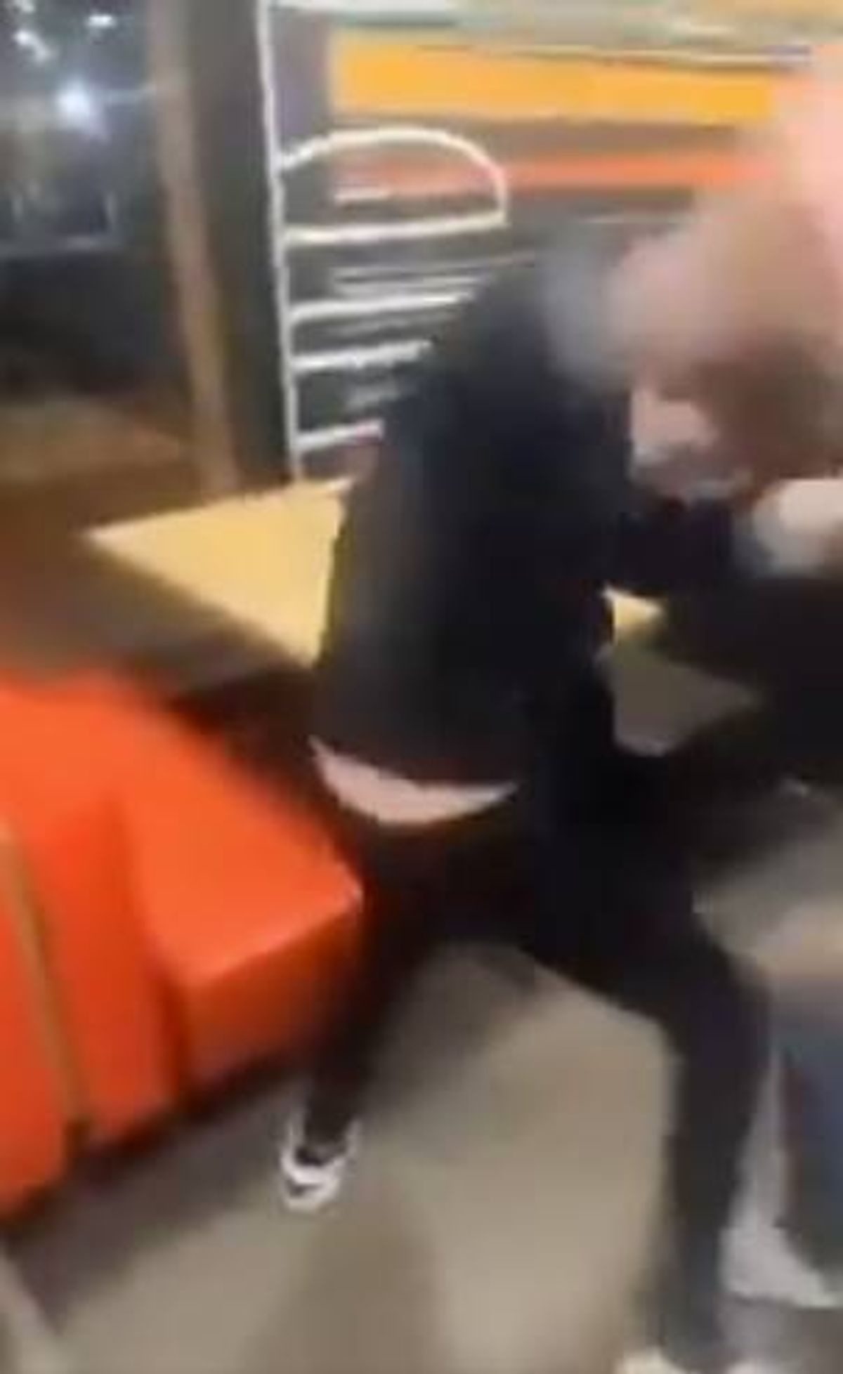 Shocked customers watched out as the fight broke out