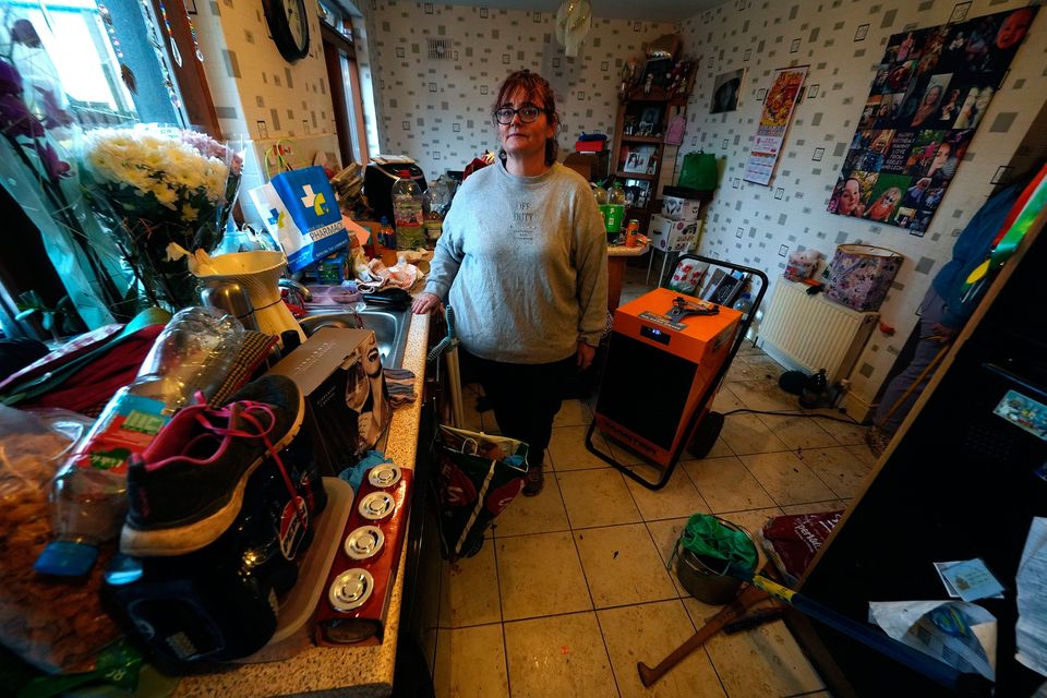 Elaine Byrne at her flood damaged home in Riverfield in Aughrim, Co Wicklow. Photo: PA