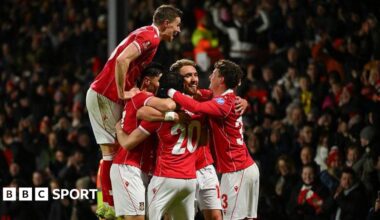 Wrexham players celebrate during their FA Cup third-round win over Nottingham Forest