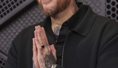 Jelly Roll pictured cozying up to Kristi Noem in resurfaced snaps... just days after singer avoided talking about ICE