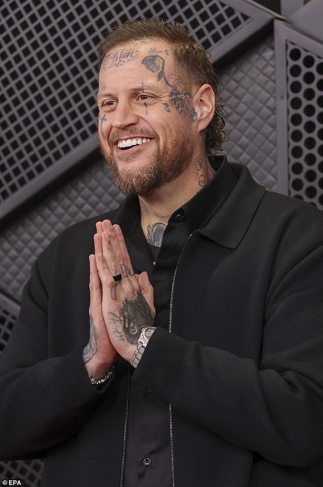 Jelly Roll pictured cozying up to Kristi Noem in resurfaced snaps... just days after singer avoided talking about ICE