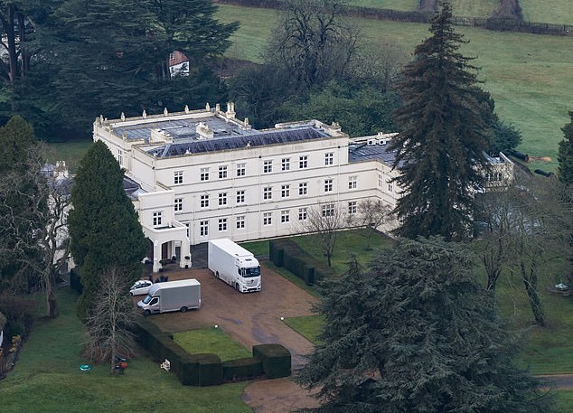Removal vans seen outside Royal Lodge on Wednesday, where Andrew and Sarah Ferguson have lived for the past two decades