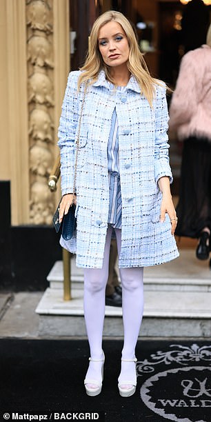 The presenter turned heads in a blue and white boucle jacket which she wore over a matching striped mini dress
