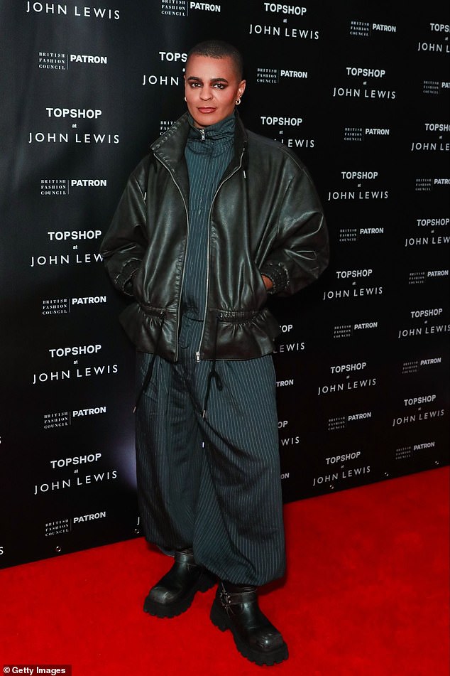 Layton Williams sported a dark green striped jumpsuit and a leather jacket