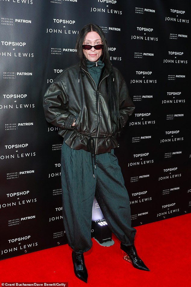 Elsewhere Kyle De-Volle looked chic in a dark green pinstripe co-ord featuring barrel-leg trousers and a zip-up sweater, paired with a leather bomber jacket and patent boot heels
