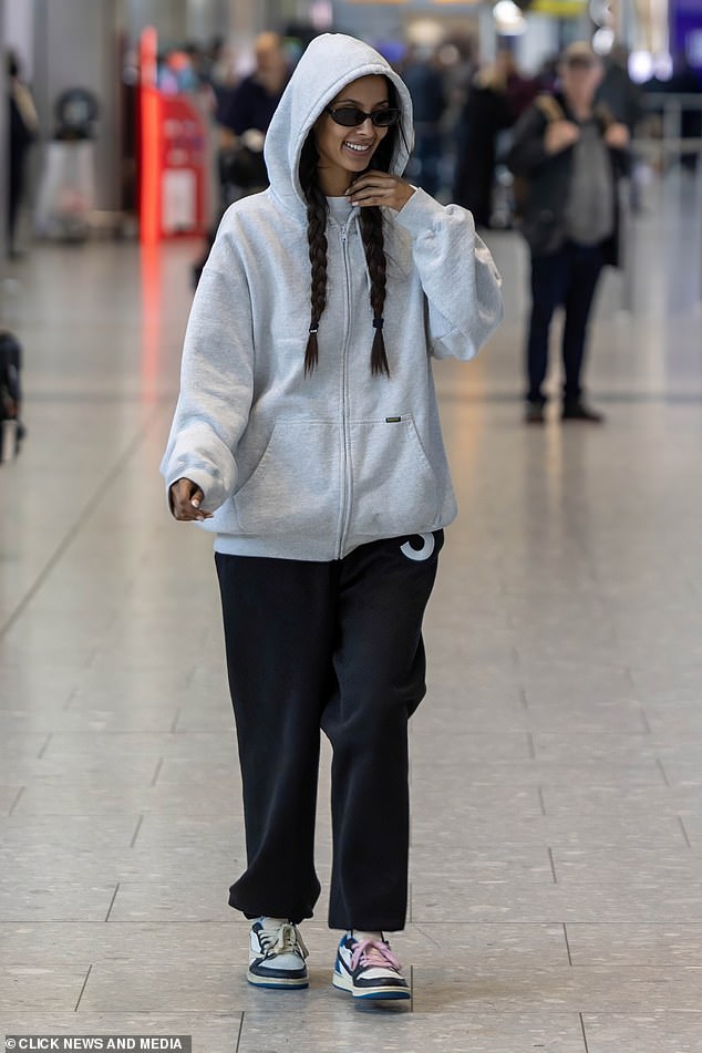 Maya completed her airport ensemble by styling her dark tresses in two neat plaits and rocked a pair of Nike trainers