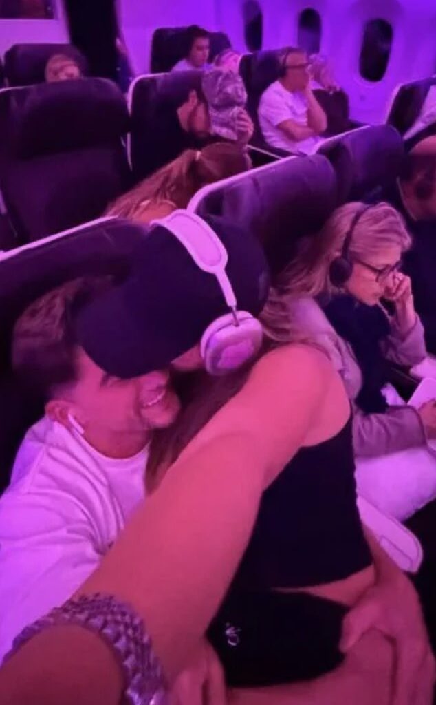 The reality star, who actually worked as an air hostess prior to finding fame, decided it would be a great idea to sit on the lap of her new boyfriend, Sean Stone, in front of total strangers