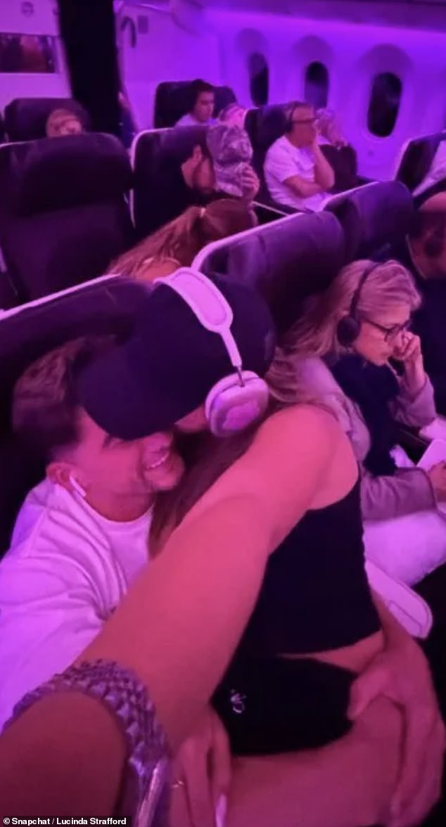 The reality star, who actually worked as an air hostess prior to finding fame, decided it would be a great idea to sit on the lap of her new boyfriend, Sean Stone, in front of total strangers