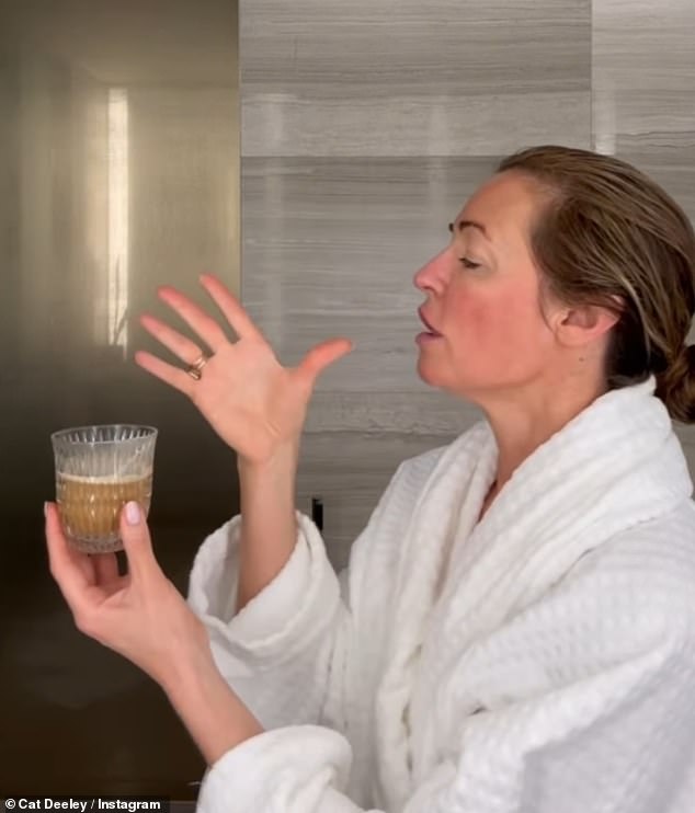 Sipping on a morning coffee to boost her energy, Cat grooved for the camera before changing into her stylish outfit for the day