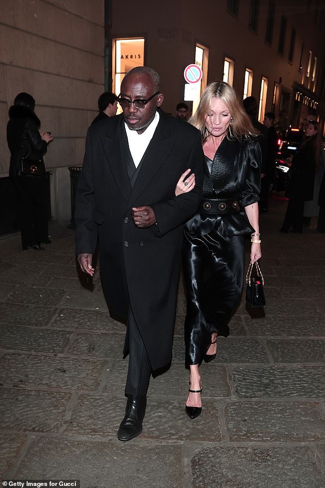 Supermodel Kate was snapped arriving at Baretto in a sleek satin gown which she paired with pointed black heels and a small structured handbag