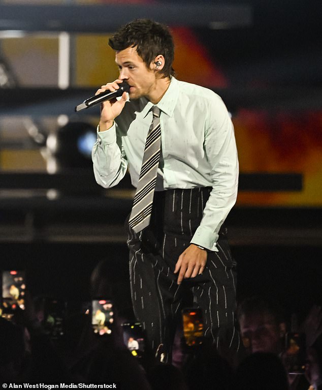 Oozing confidence he cut a stylish figure, swapping his usual sequinned stage outfits for a subdued shirt and tie for very memorable routine