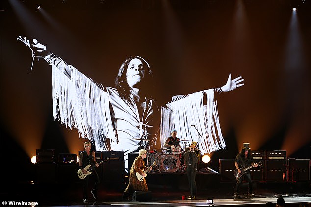 LOS ANGELES, CALIFORNIA - FEBRUARY 01: (FOR EDITORIAL USE ONLY) (L-R) Duff McKagan, Alex Watt, Chad Smith, Post Malone and Slash perform onstage during the 68th GRAMMY Awards at Crypto.com Arena on February 01, 2026 in Los Angeles, California. (Photo by JC Olivera/WireImage)