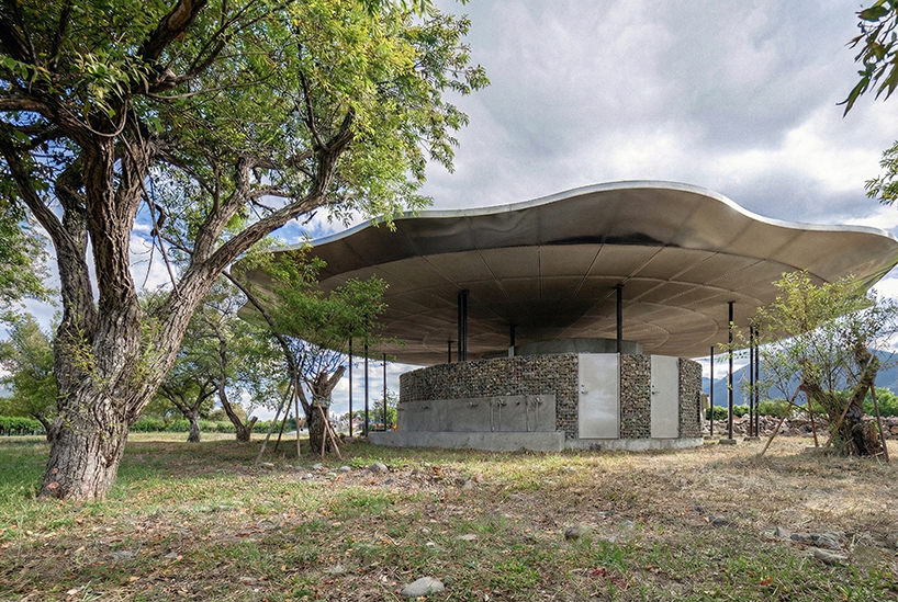 lotus garden a waterside ecological cycling station with metal lotus leaves floating in dapo pond taiwan 2