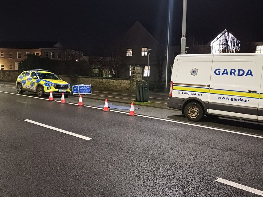 A blue coloured blanket can be seen lying inside a garda cordon outside Longford Garda Station.