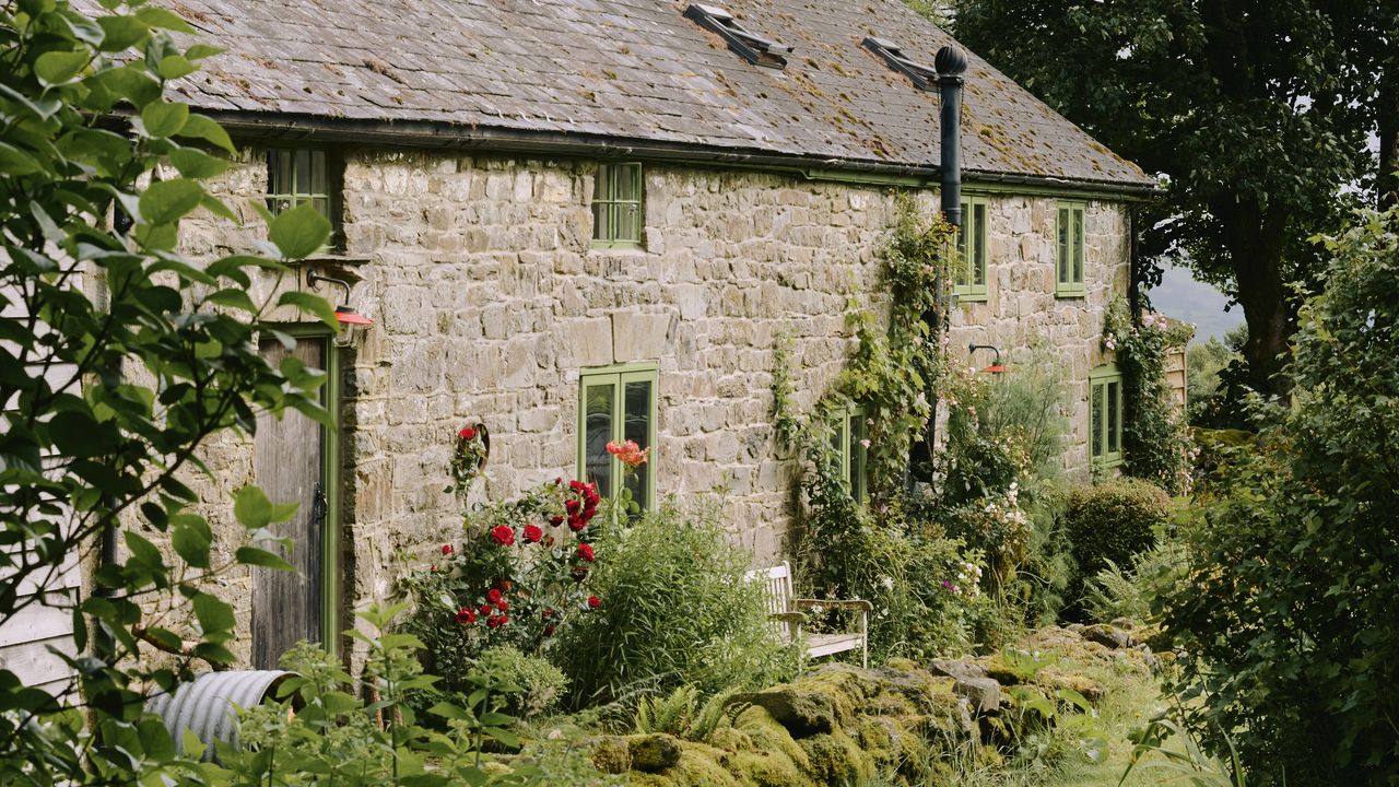 An ancient longhouse in the Welsh hills restored to an authentic state by its photographer owner