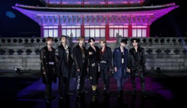 BTS poses in front of Geunjeongjeon Hall of Gyeongbok Palace in Seoul, where the band filmed a performance for the