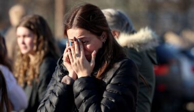 A woman reacts near the Lynch Arena in Pawtucket after a shooting at the ice rink. Pic: AP