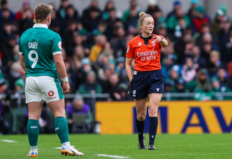 Referee Hollie Davidson shows Ireland's Craig Casey a yellow card during the game against Italy. Photograph: Ben Brady/Inpho