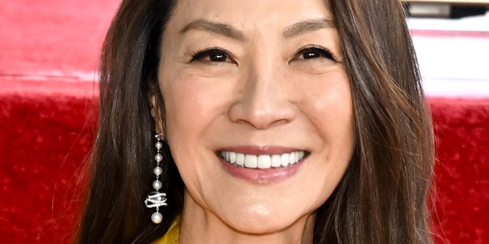 Michelle Yeoh on “emotional” milestone in her 60s as she shines in yellow midi dress