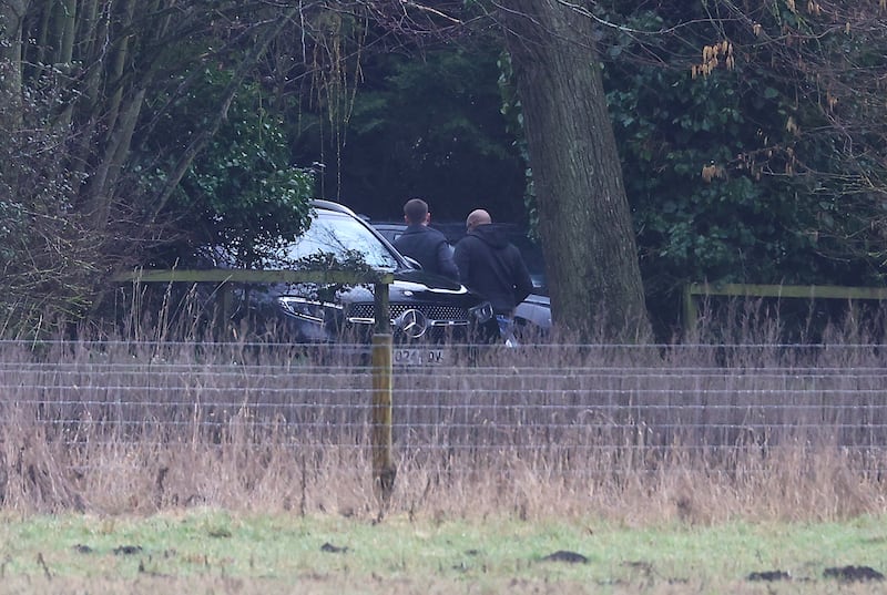 Plainclothes police officers at Wood Farm in Sandringham, Norfolk, the home of the former prince. Photograph: Peter Nicholls/Getty Images