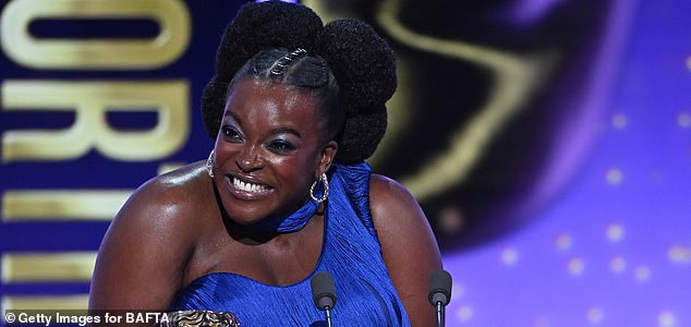LONDON, ENGLAND - FEBRUARY 22: Wunmi Mosaku accepts the Supporting Actress Award for 'Sinners' on stage during the EE BAFTA Film Awards 2026 at The Royal Festival Hall on February 22, 2026 in London, England. (Photo by Stuart Wilson/BAFTA/Getty Images for BAFTA)