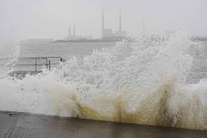 Waves crash against the sea wall in Clontarf earlier this month. Photograph: Brian Lawless/PA