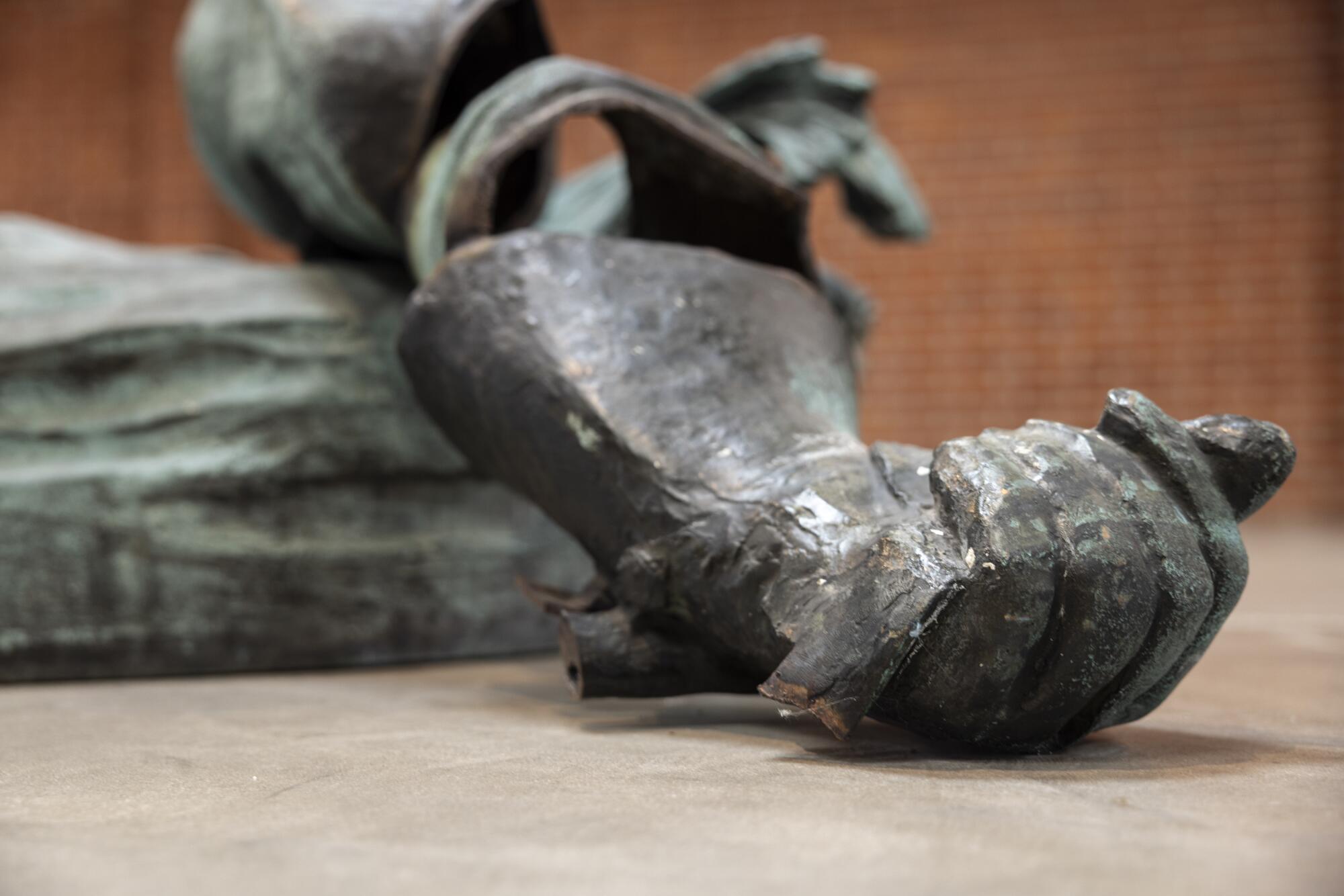 A detail of an arm on a Stonewall Jackson sculpture.