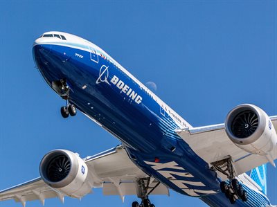 Close-up of a blue airplane taking off. Editorial use only.