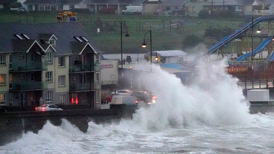 Waves crash against the sea wall in Tramore, Co Waterford, 50km up the coast from Youghal, during Storm Betty. Photo: Niall Carson/PA Wire