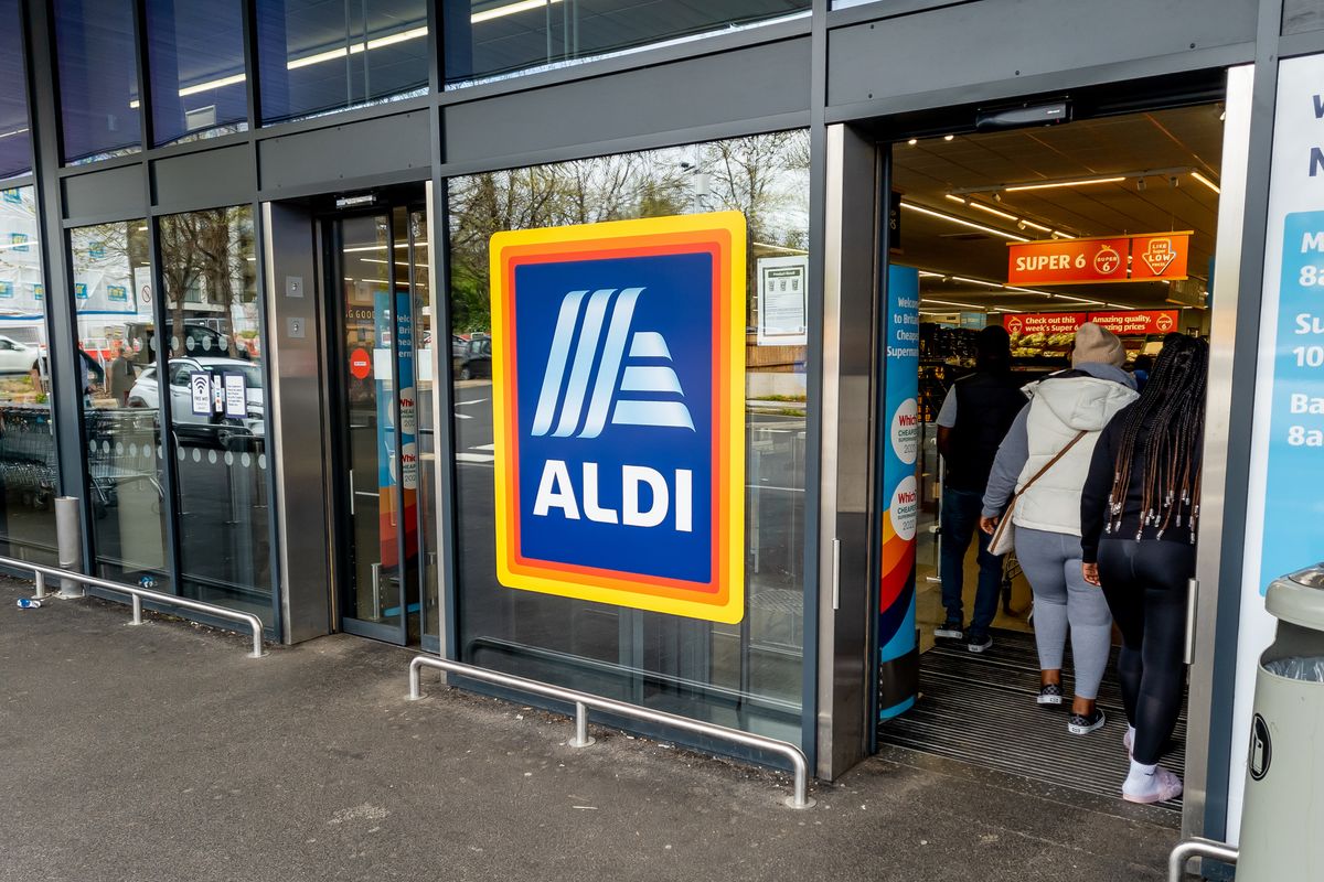 The entrance and exit of a branch of Aldi grocery supermarket 