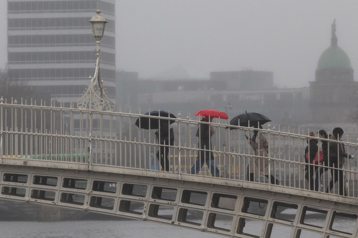 People walk in the rain in Dublin