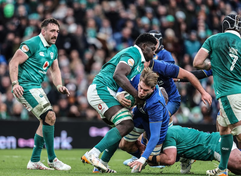 Italy's Federico Ruzza is tackled by Ireland's Edwin Edogbo. Photograph: Inpho