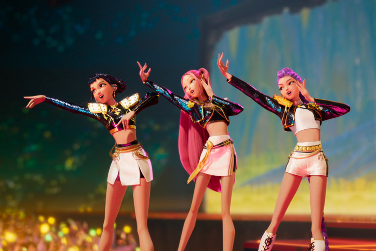 From left, Zoey, Mira, and Rumi sing on stage