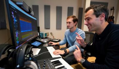 AI song generator startups Suno and Udio angered the music industry. Now they're hoping to join it