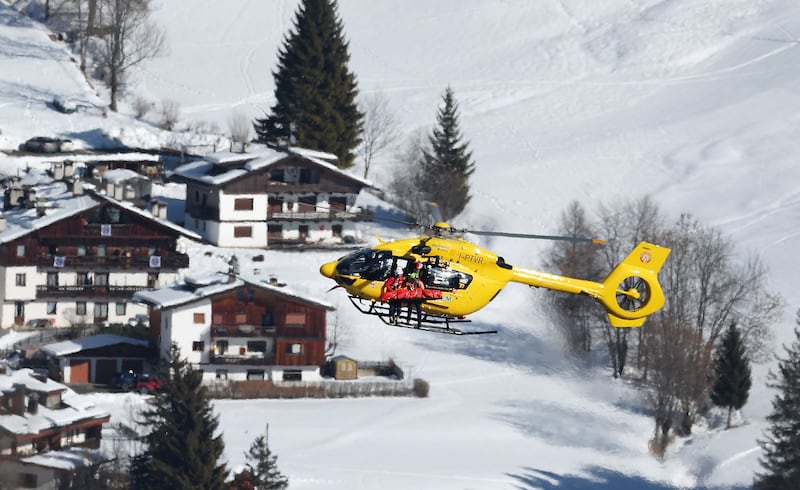 A helicopter is seen rescuing Lindsey Vonn after she crashed during the women's downhill at the  Winter Olympics. Photograph: Al Bello/Getty Images
