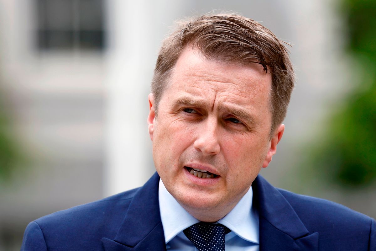 17/6/25 PHOTO SHOWS: James Browne TD, Minister for Housing, Local Government and Heritage speaking to media at Government Buildings.