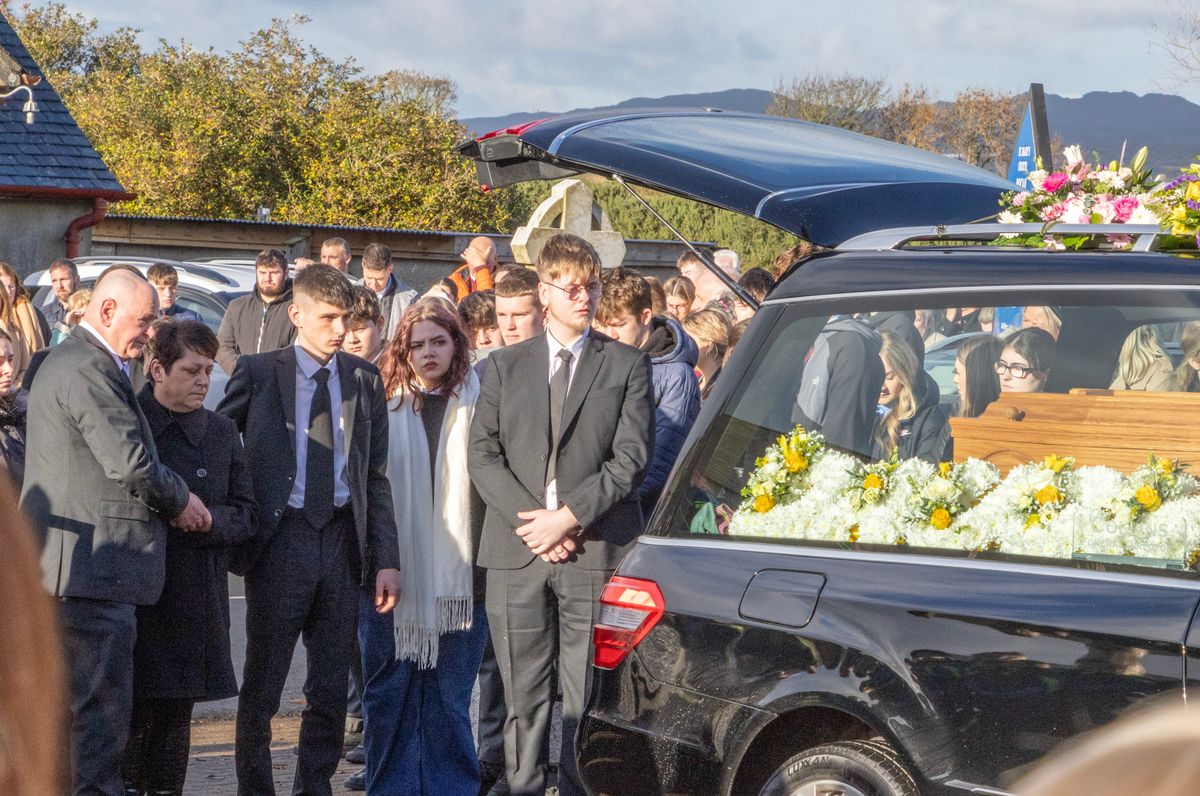 The heartbroken family of tragic Alana Harkin as they prepare to carry her remains into St Mary's Church.