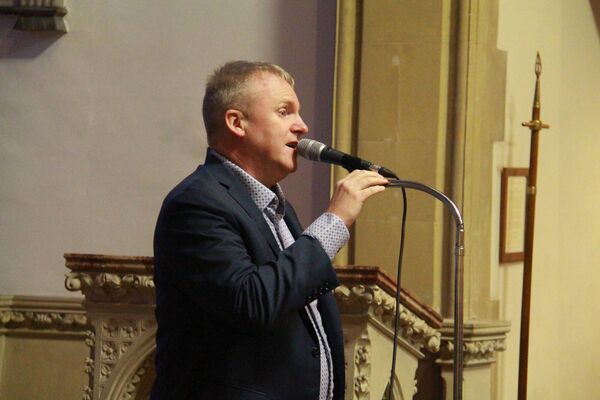 Singer Nicky Kealy performing at the concert 