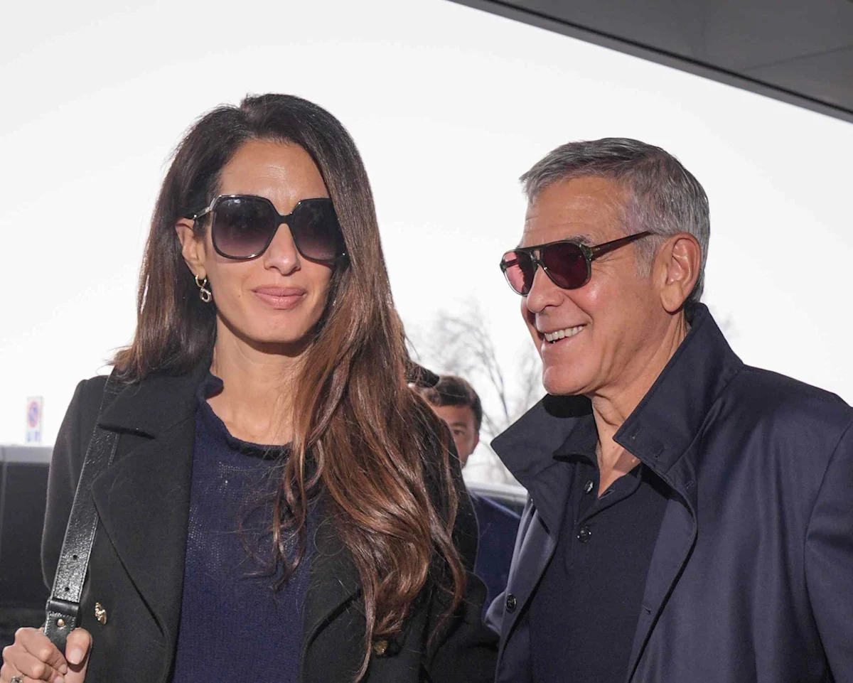 George and Amal Clooney's Coordinated Outfits Are a Masterclass in Airport Elegance