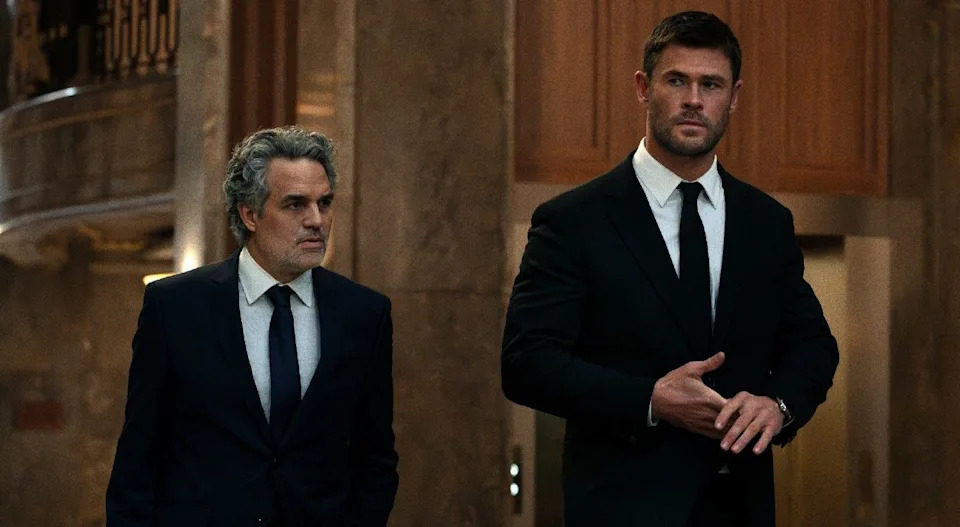  From left to right: Mark Ruffalo and Chris Hemsworth walking together. . 