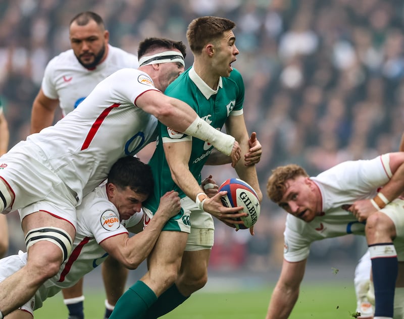 England's George Ford tackles Ireland's Jack Crowley. Photograph: Inpho
