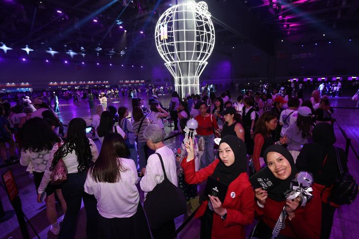 Fans enjoy the 2025 BTS Festa at the KINTEX convention center in Goyang, Gyeonggi Province, June 13, 2025. Yonhap 