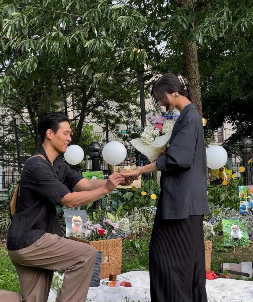 Singer-songwriter EJAE, right, getting proposed by her fiance Sam Kim, in a photo uploaded to the singer's Instagram account on Jan. 26, 2026 [SCREEN CAPTURE]