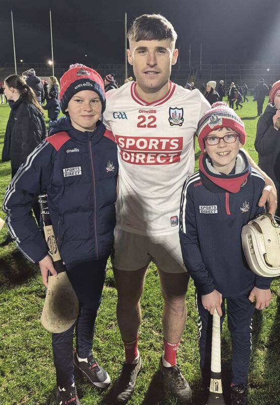 Cork hurler Brian Keating with fellow Ballincollig club members Cathal Downey and Peter Downey in Pearse Stadium.