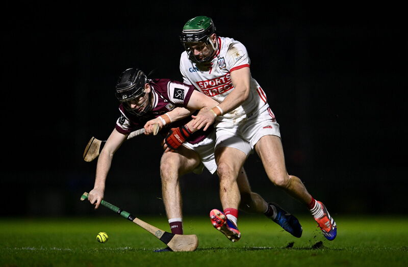 Jasonn Rabbitte of Galway is tackled by Mark Coleman of Cork at Pearse Stadium on Saturday night. Picture: Ben McShane/Sportsfile