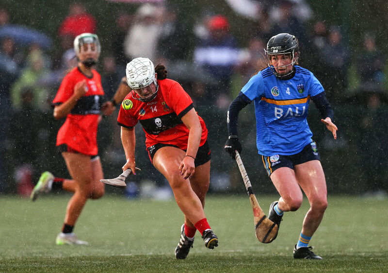 University College Cork’s Cliona Dooley gets away from Katie Byrne of University College Dublin. Picture: INPHO/Tom O’Hanlon