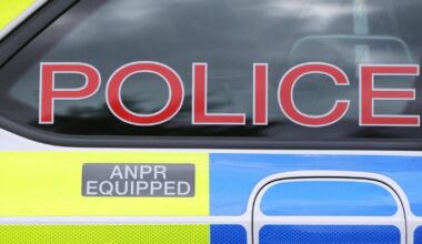 Woman dies and man seriously injured in car and bus crash