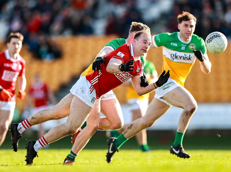 Matty Taylor of Cork in action against David Dempsey of Offaly. Picture: Thomas Flinkow/Sportsfile
