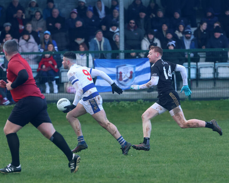 Ethon Varion, Ballyphehane, in possession of the ball against Brian Blackwell in the Munster Junior B semi-final. Picture: Brendan Gleeson